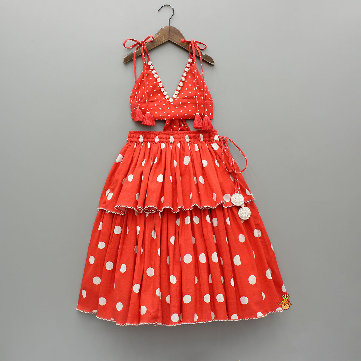 Red Dot Printed Tie Up Strap Top And Layered Lehenga