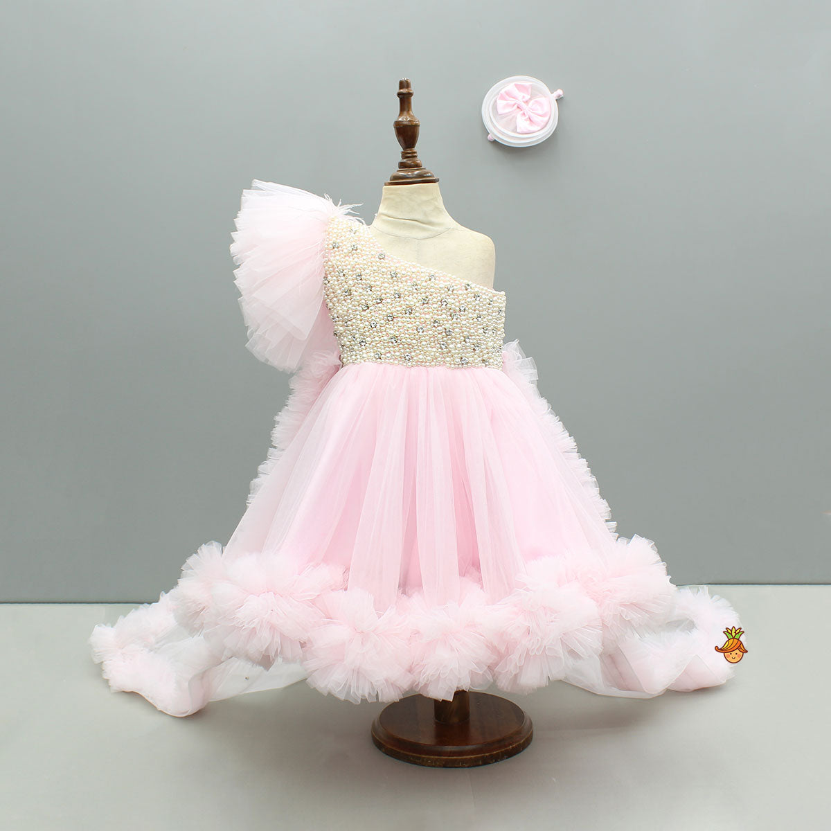 Pink One Shoulder Embellished Dress With Detachable Trial And Bow With Matching Swirled Bowie Headband