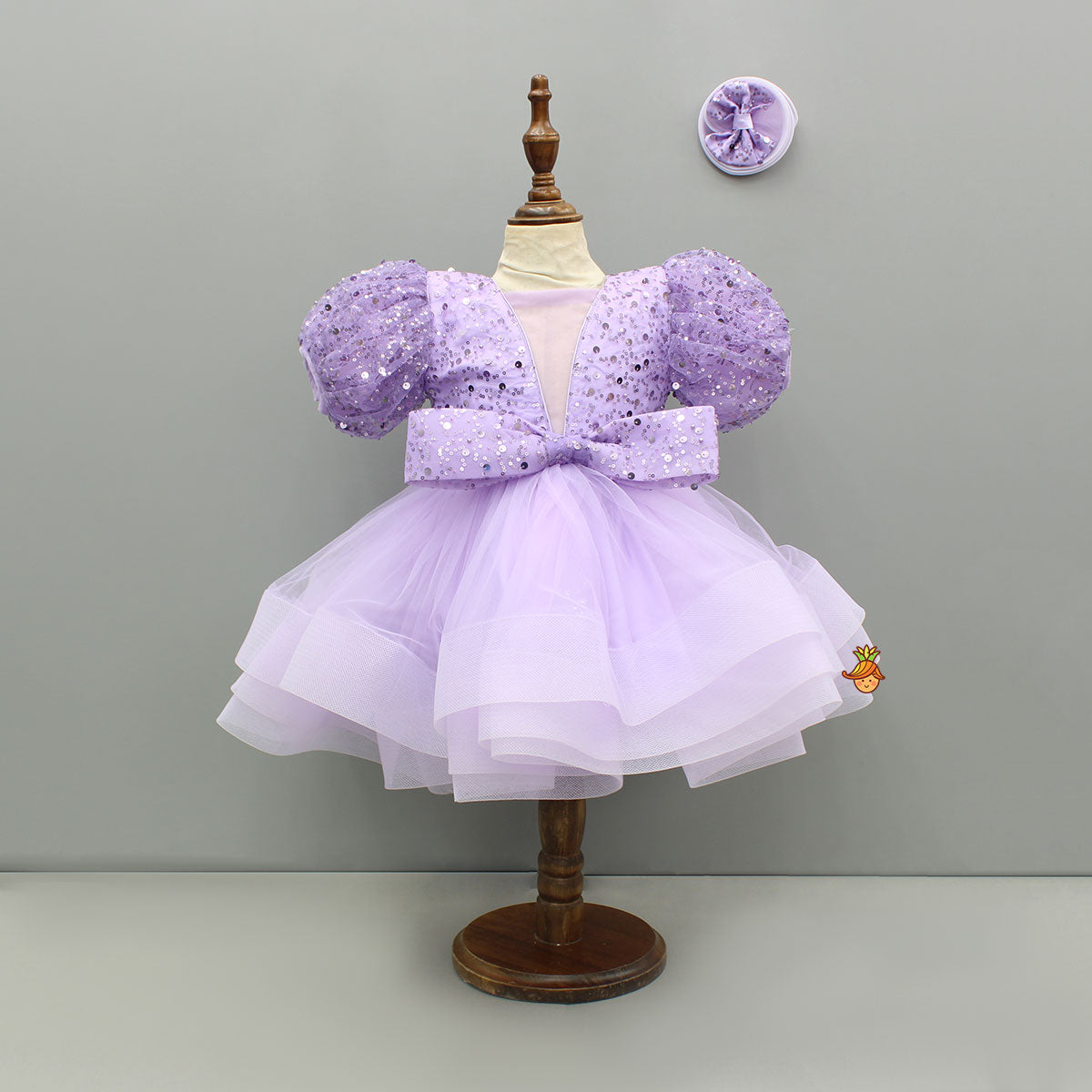 Sequined Ruffled Lavender Dress With Bows And Matching Swirled Bow Hairclip