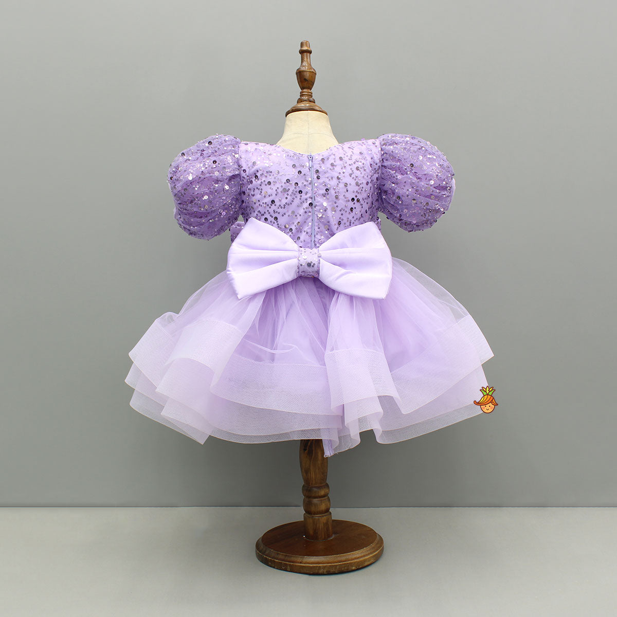 Sequined Ruffled Lavender Dress With Bows And Matching Swirled Bow Hairclip