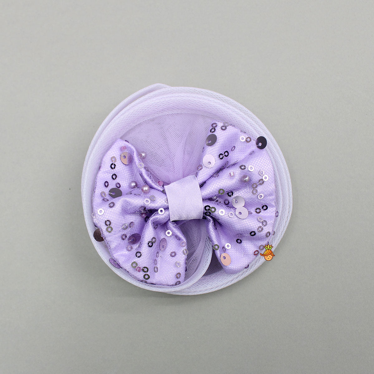 Sequined Ruffled Lavender Dress With Bows And Matching Swirled Bow Hairclip
