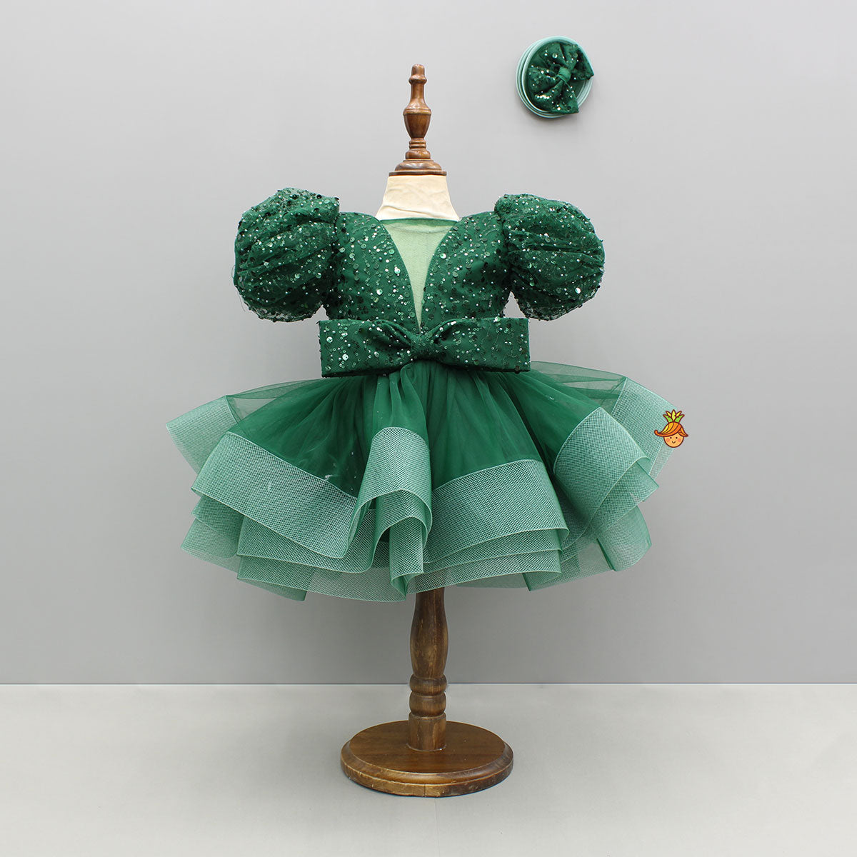 Green Sequined Ruffled Dress With Bows And Matching Swirled Bow Hairclip