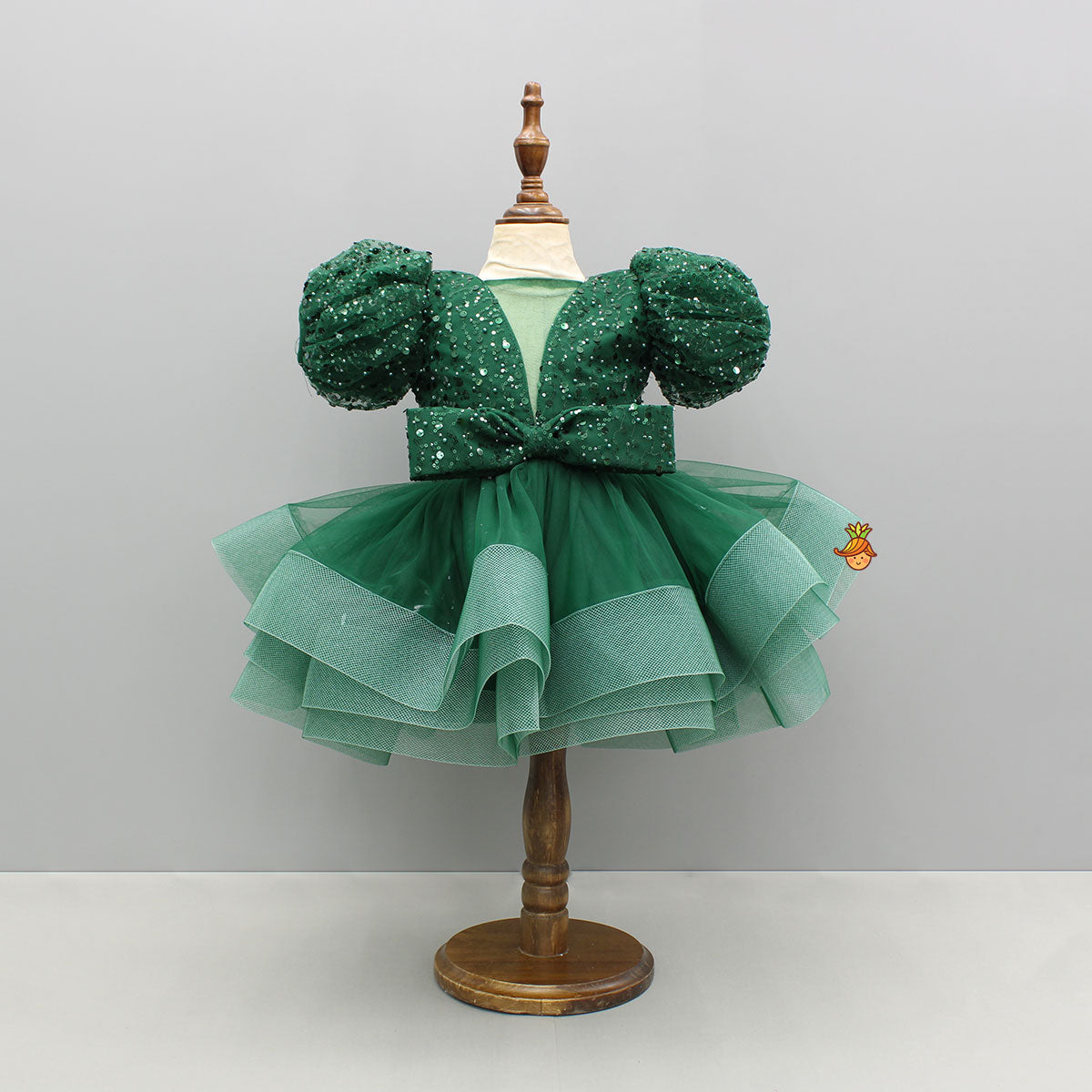 Green Sequined Ruffled Dress With Bows And Matching Swirled Bow Hairclip
