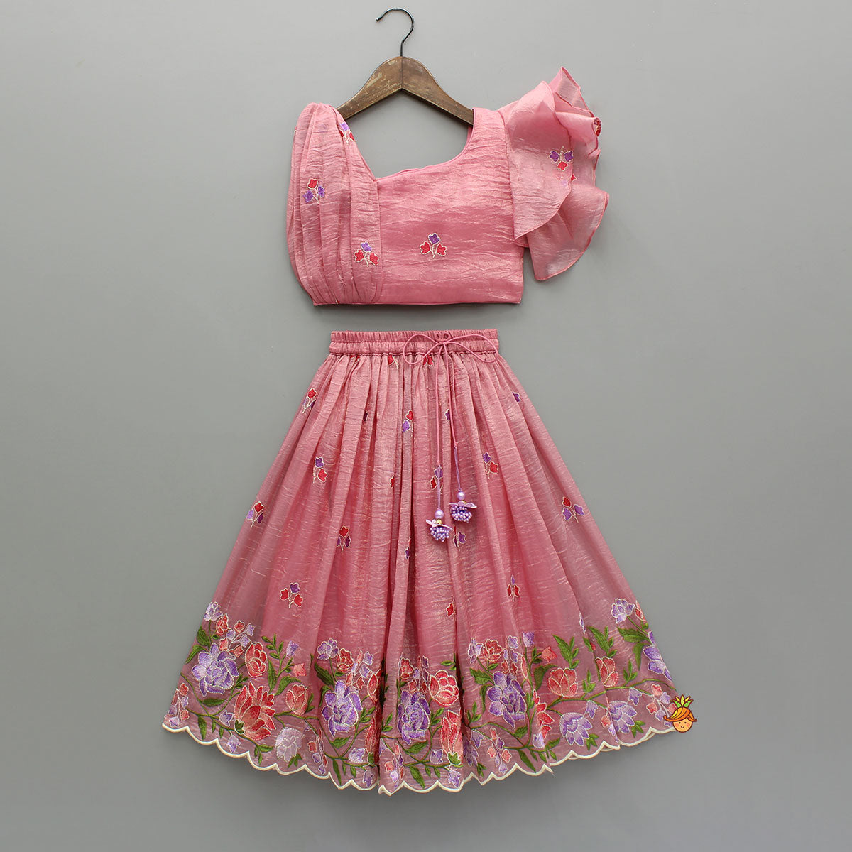 Pink One-Shoulder Pleated Drape Top With Floral Embroidered Lehenga And Net Dupatta