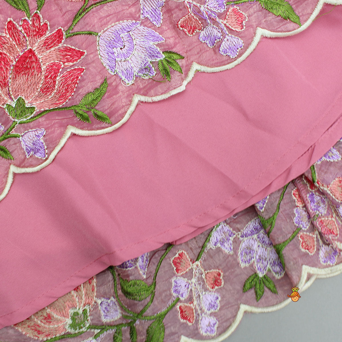 Pink One-Shoulder Pleated Drape Top With Floral Embroidered Lehenga And Net Dupatta