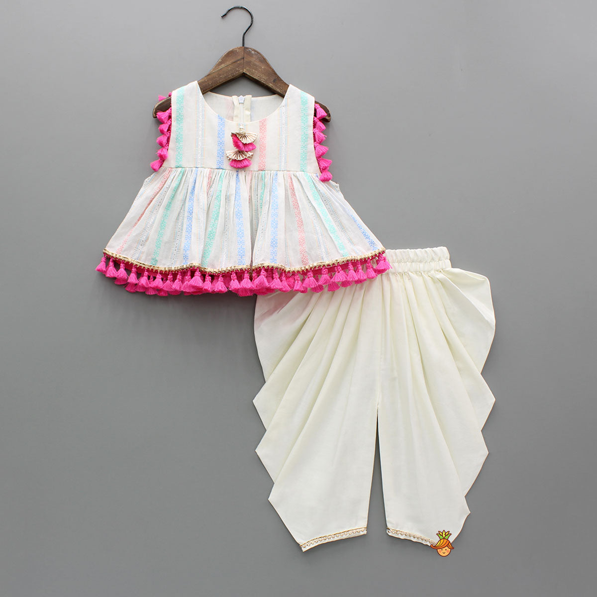 Off White Peplum Top With Tassel Detailing And Dhoti