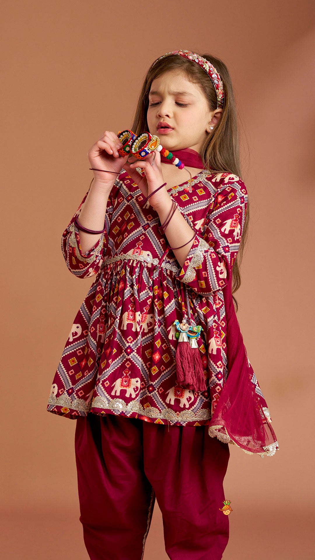 Beautiful Patola-Printed Angarkha Style Kurti And Dhoti With Dupatta