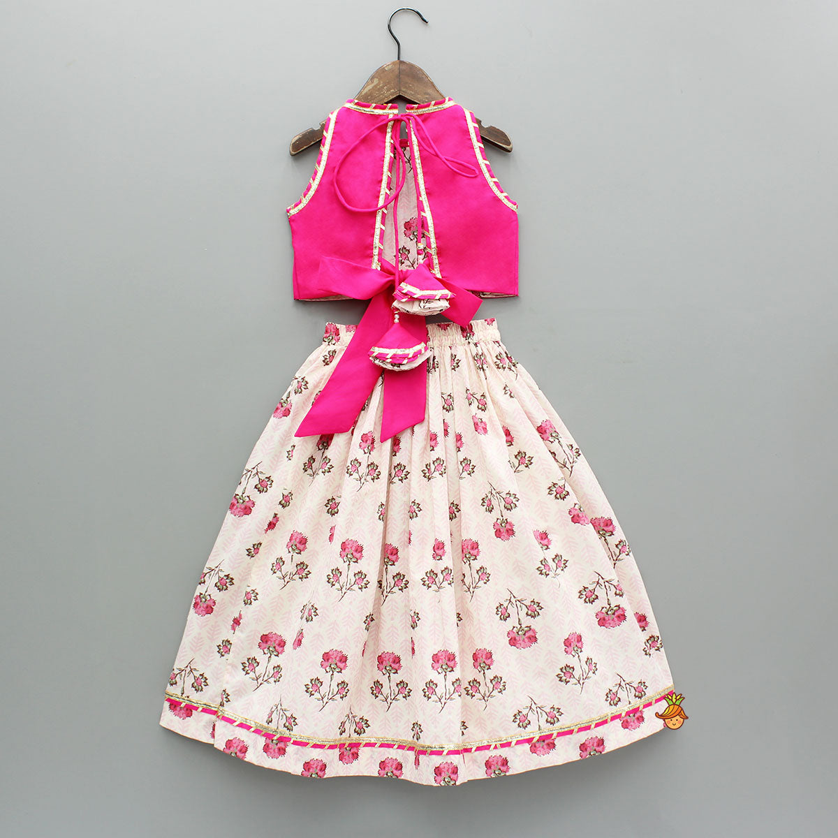 Goddess Embroidered Pink Top And Beautiful Tassels Embellished Lehenga With Matching Sling Bag