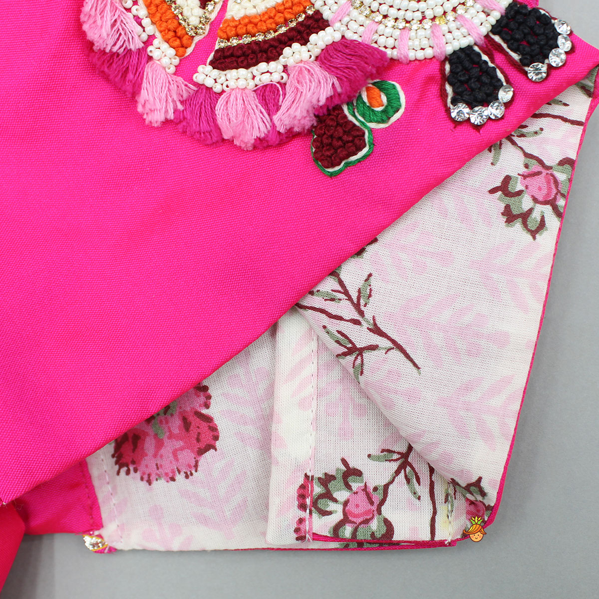 Goddess Embroidered Pink Top And Beautiful Tassels Embellished Lehenga With Matching Sling Bag