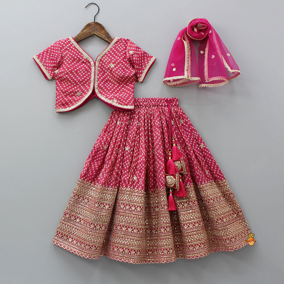 V-Neck Bandhani-Printed Pink Shimmery Top And Lehenga With Sequins Embroidered Matching Dupatta