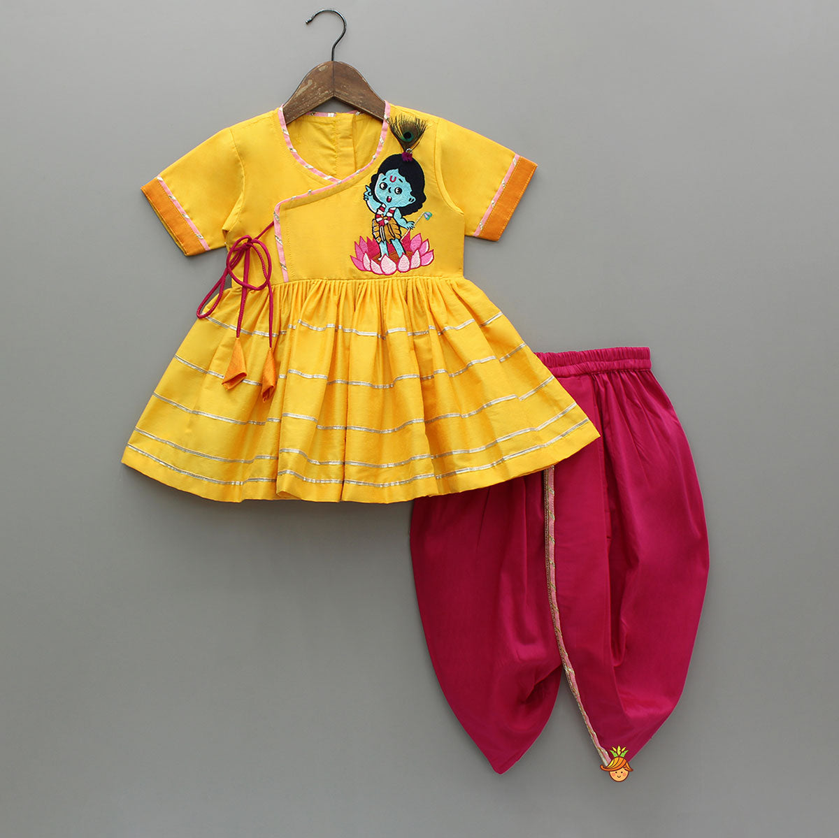 Krishna Embroidered Yellow Angarkha Top With Lace Work Pink Dhoti And Mukut