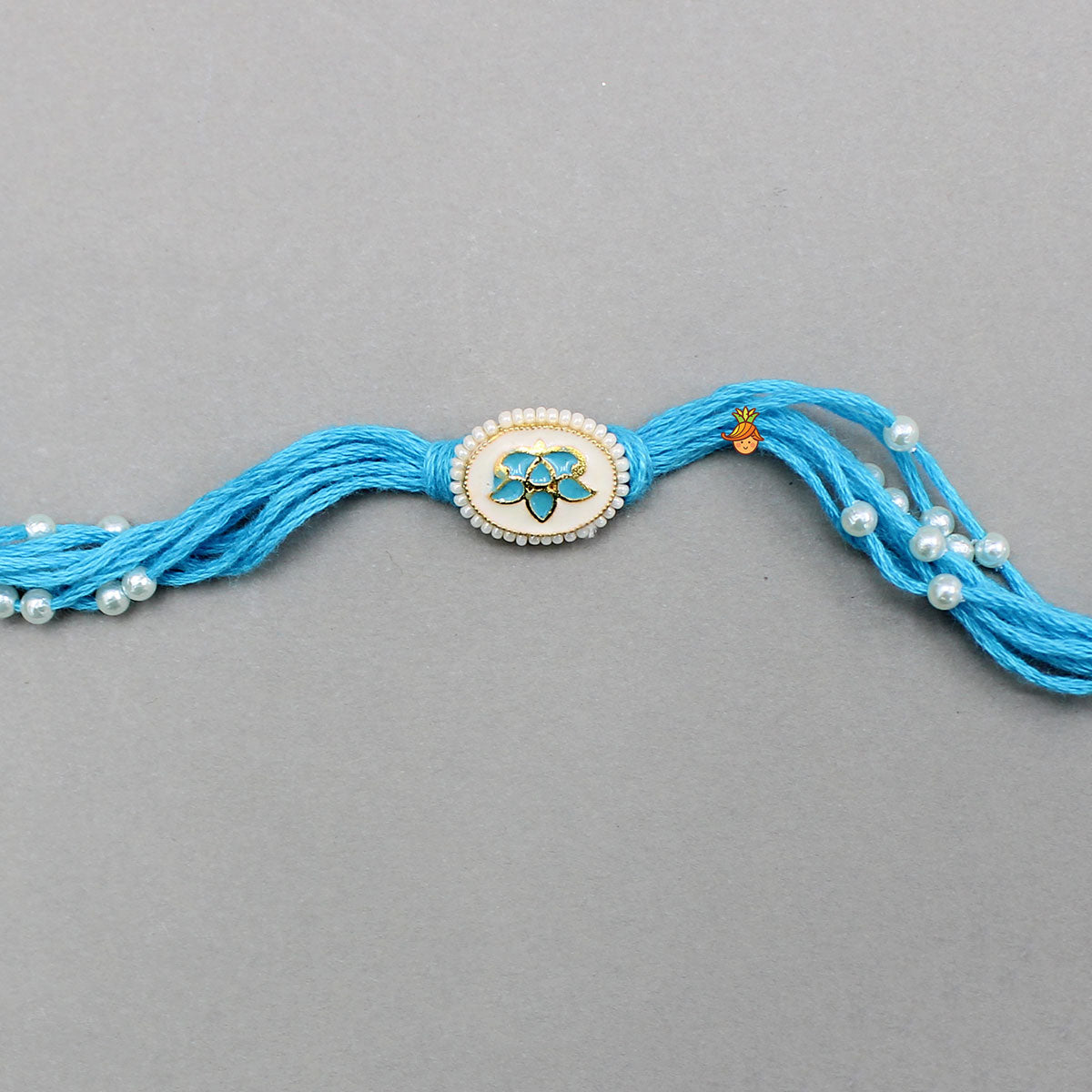 Blue Thread Lotus Rakhi