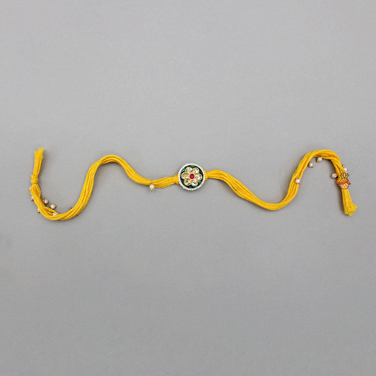Yellow Thread Floral Design Rakhi