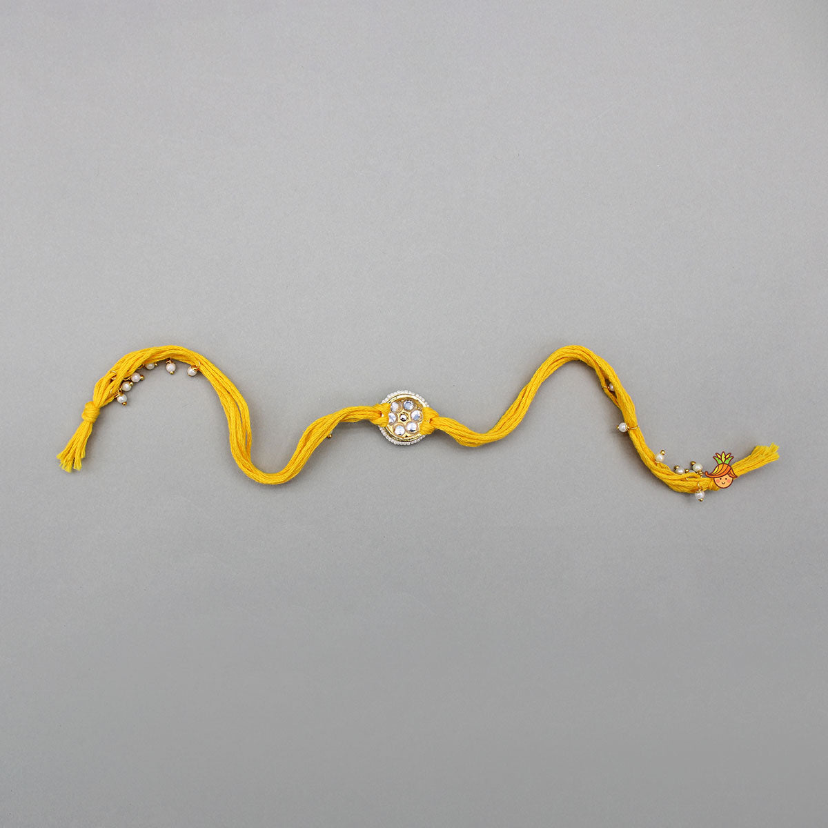 Yellow Thread Floral Design Rakhi