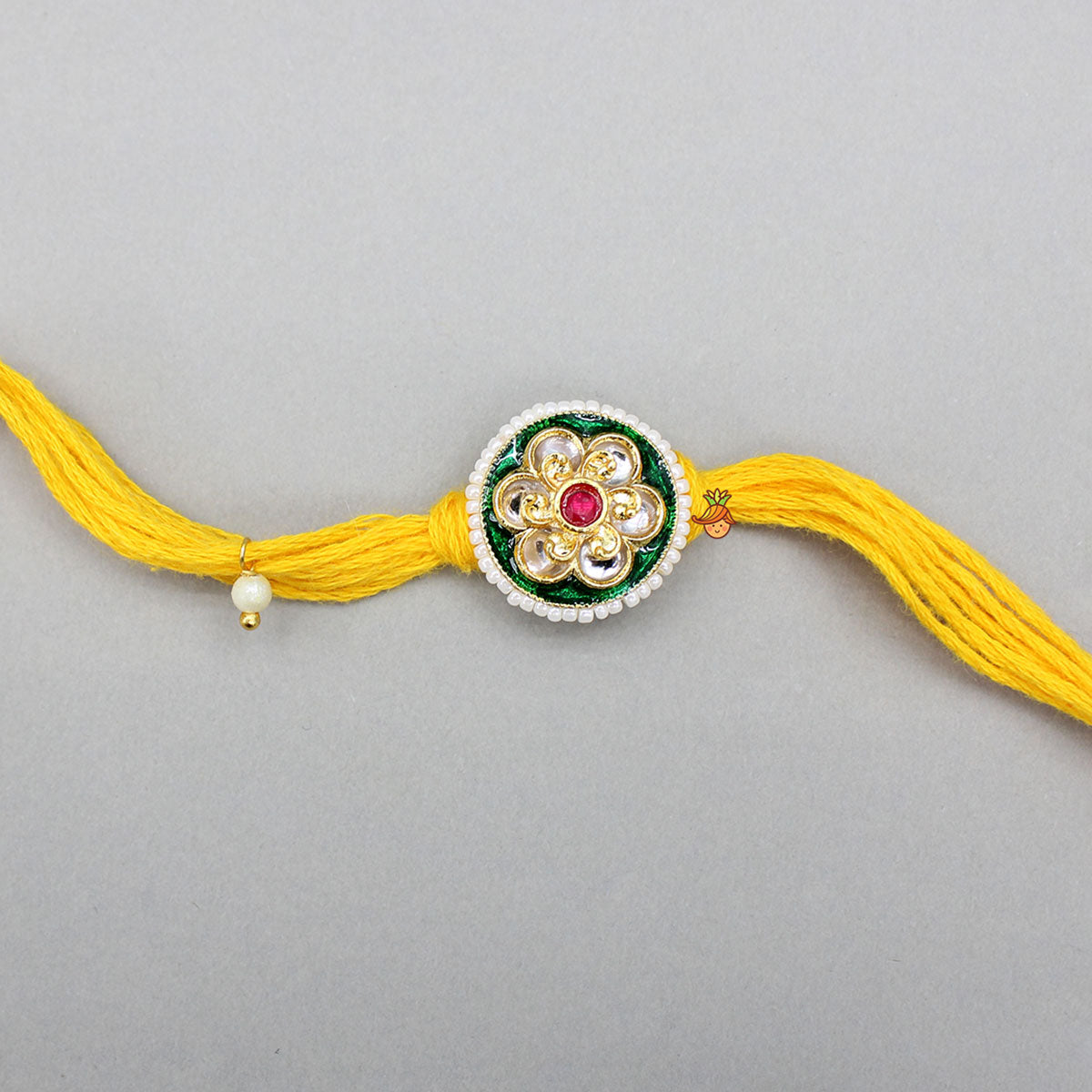 Yellow Thread Floral Design Rakhi