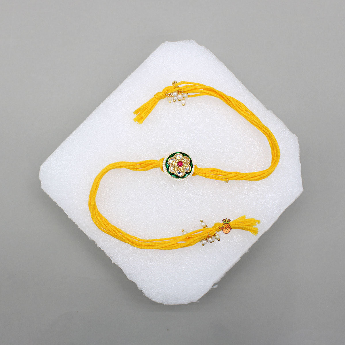 Yellow Thread Floral Design Rakhi