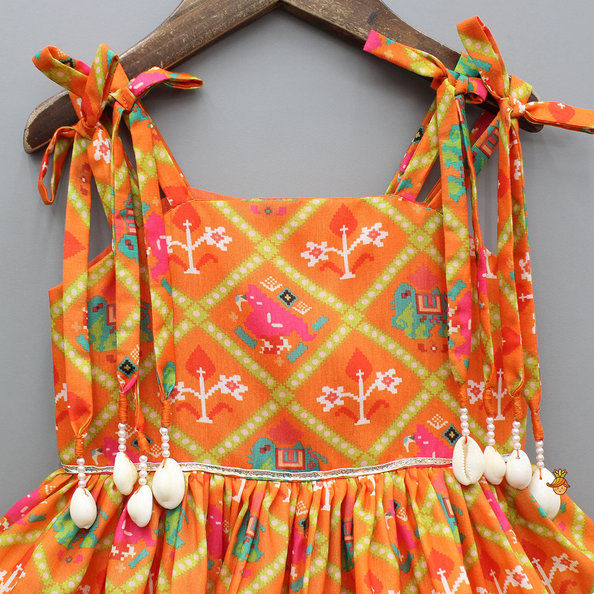 Orange Printed Tie-Up Dress With Floral Mor Pankh Hair Clip