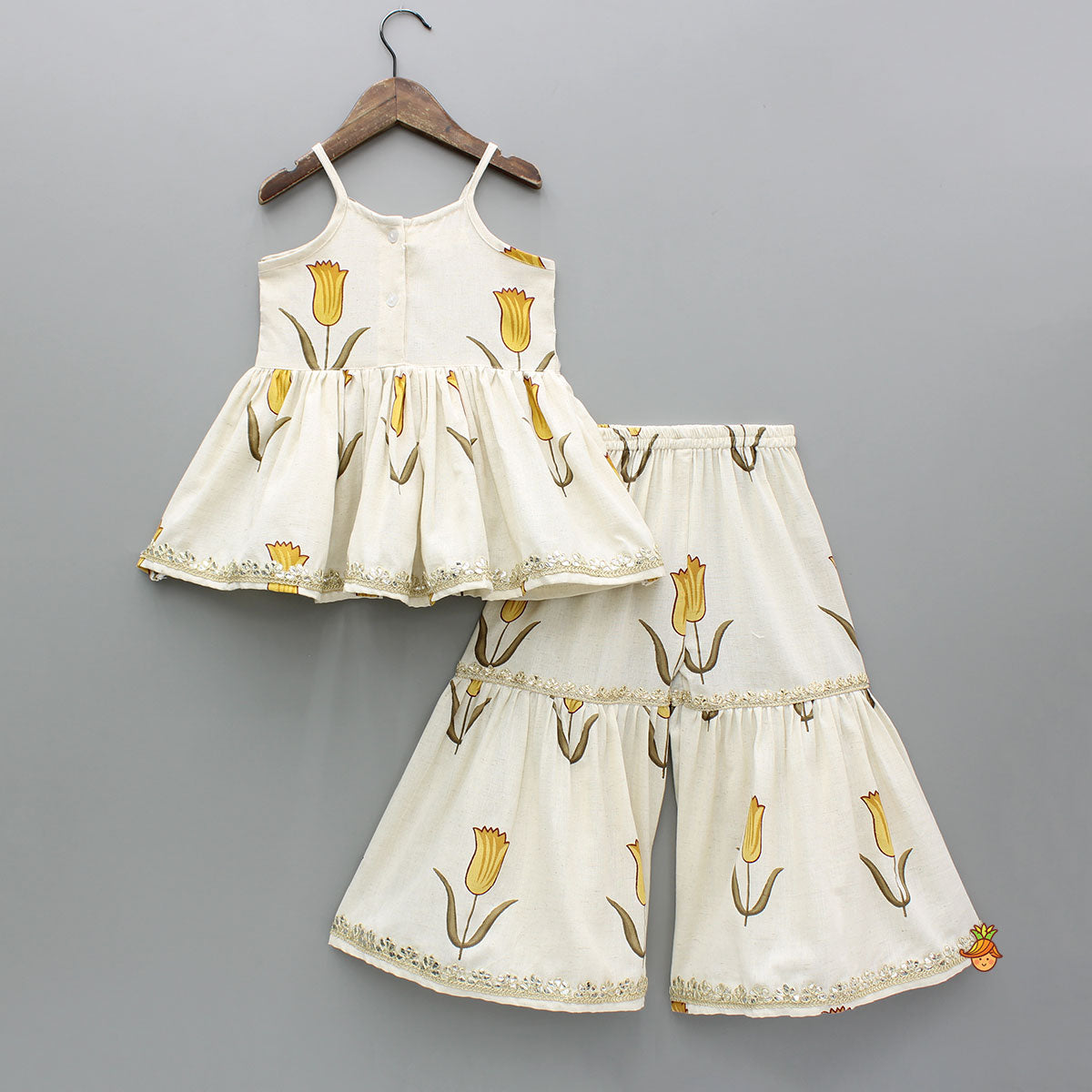 Yellow Tulip Printed Strappy Off White Kurti With Printed Sharara And Dupatta