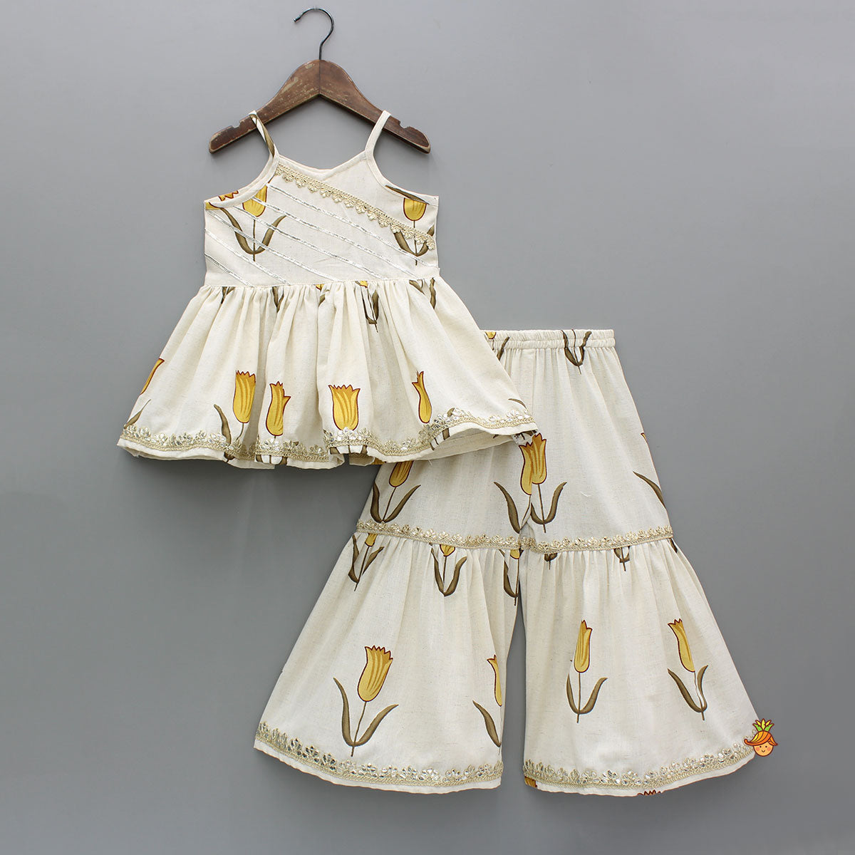 Yellow Tulip Printed Strappy Off White Kurti With Printed Sharara And Dupatta