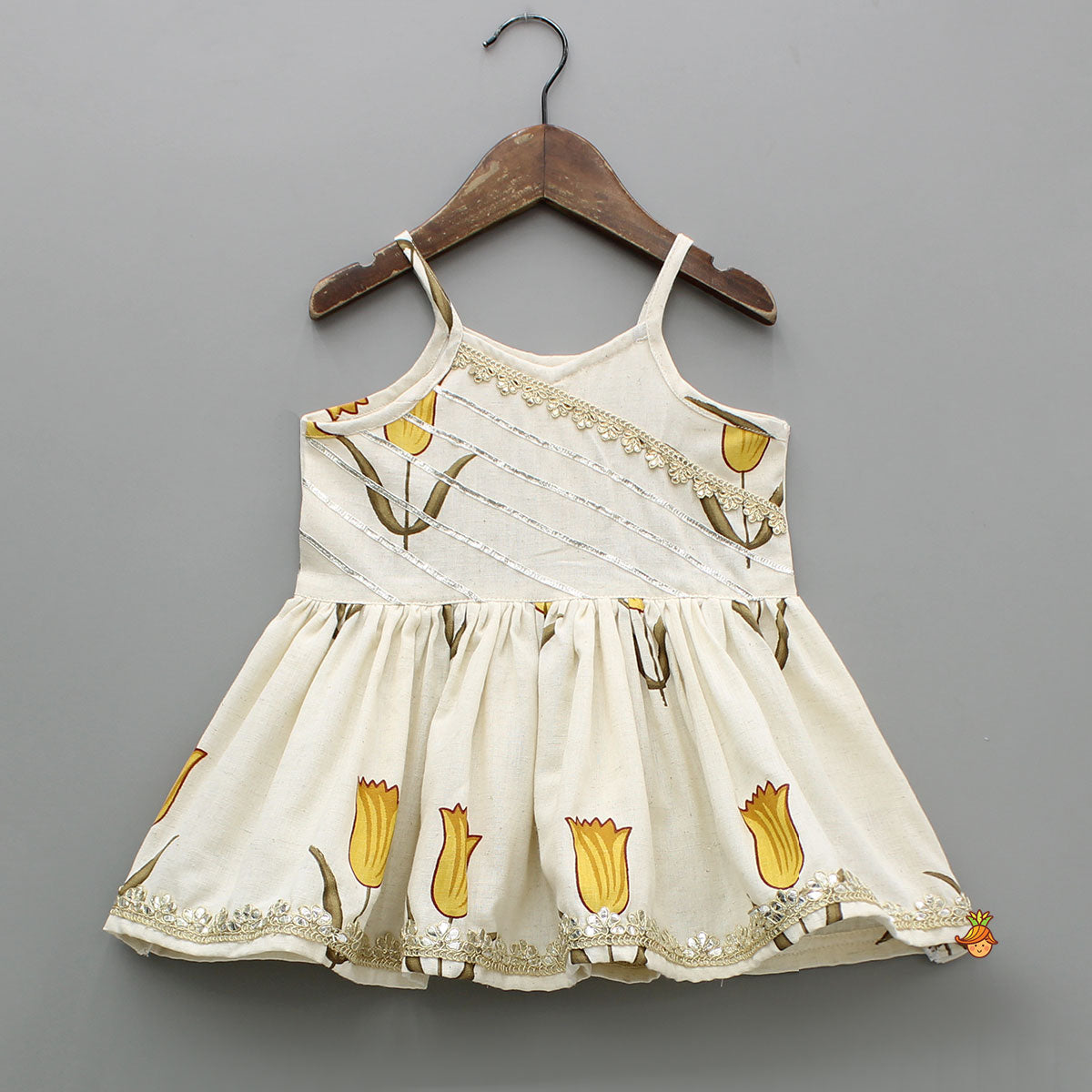 Yellow Tulip Printed Strappy Off White Kurti With Printed Sharara And Dupatta