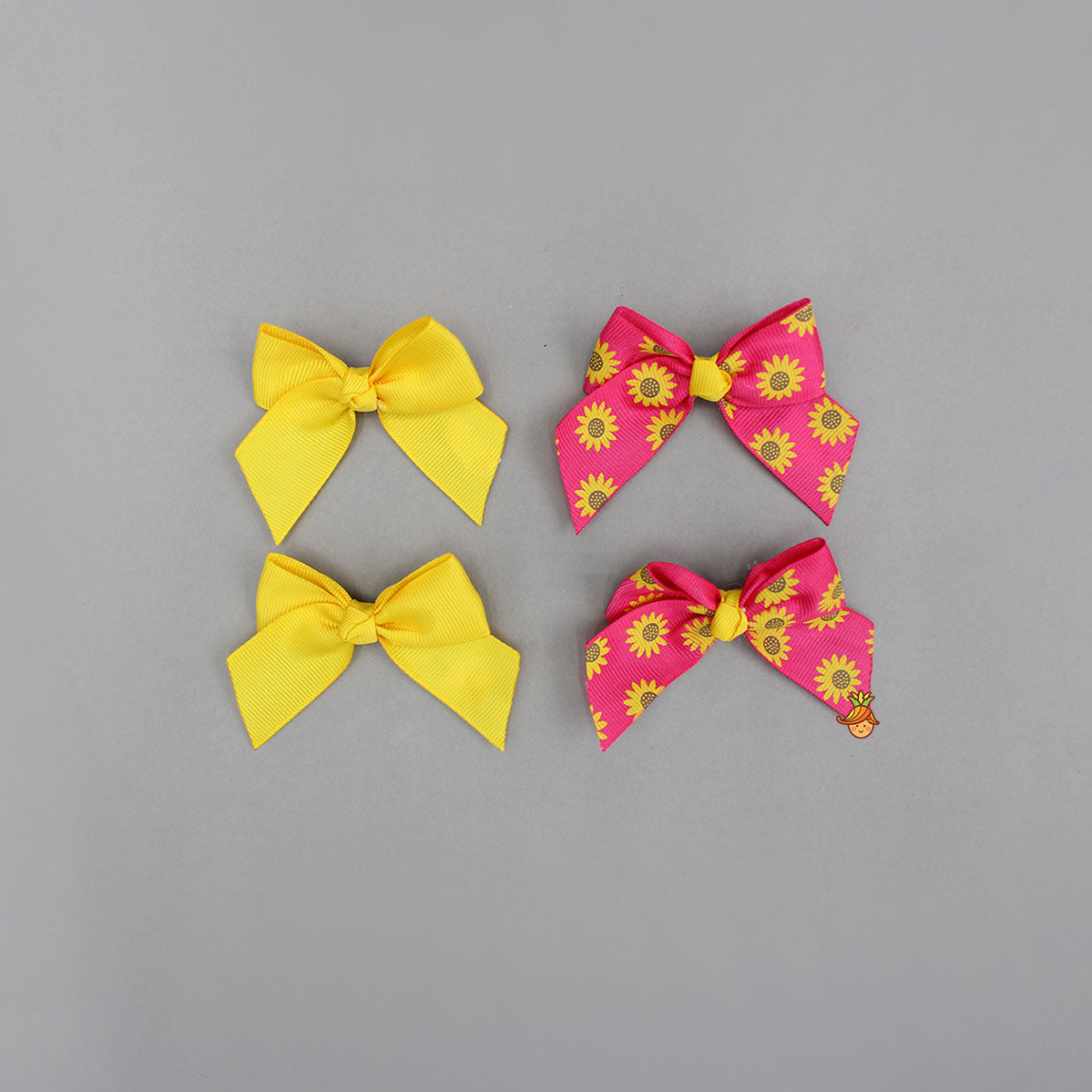 Set Of Sunflower Printed Pink And Solid Yellow Bow Hair Clips