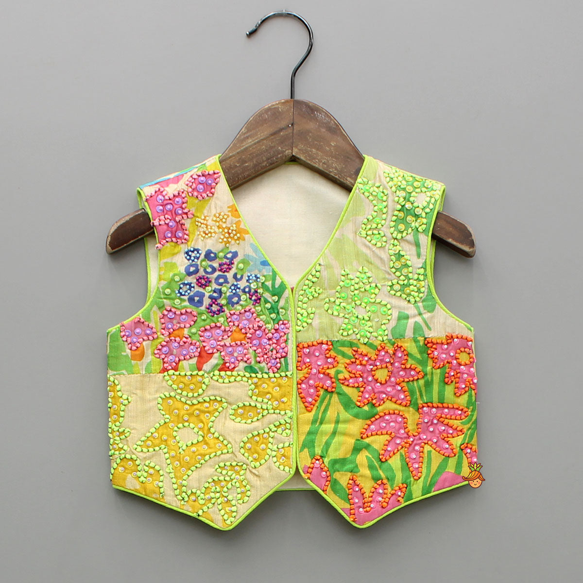 Embroidered Waist Coat Style Top With Skirt Style Lehenga And Bow Hair Clip
