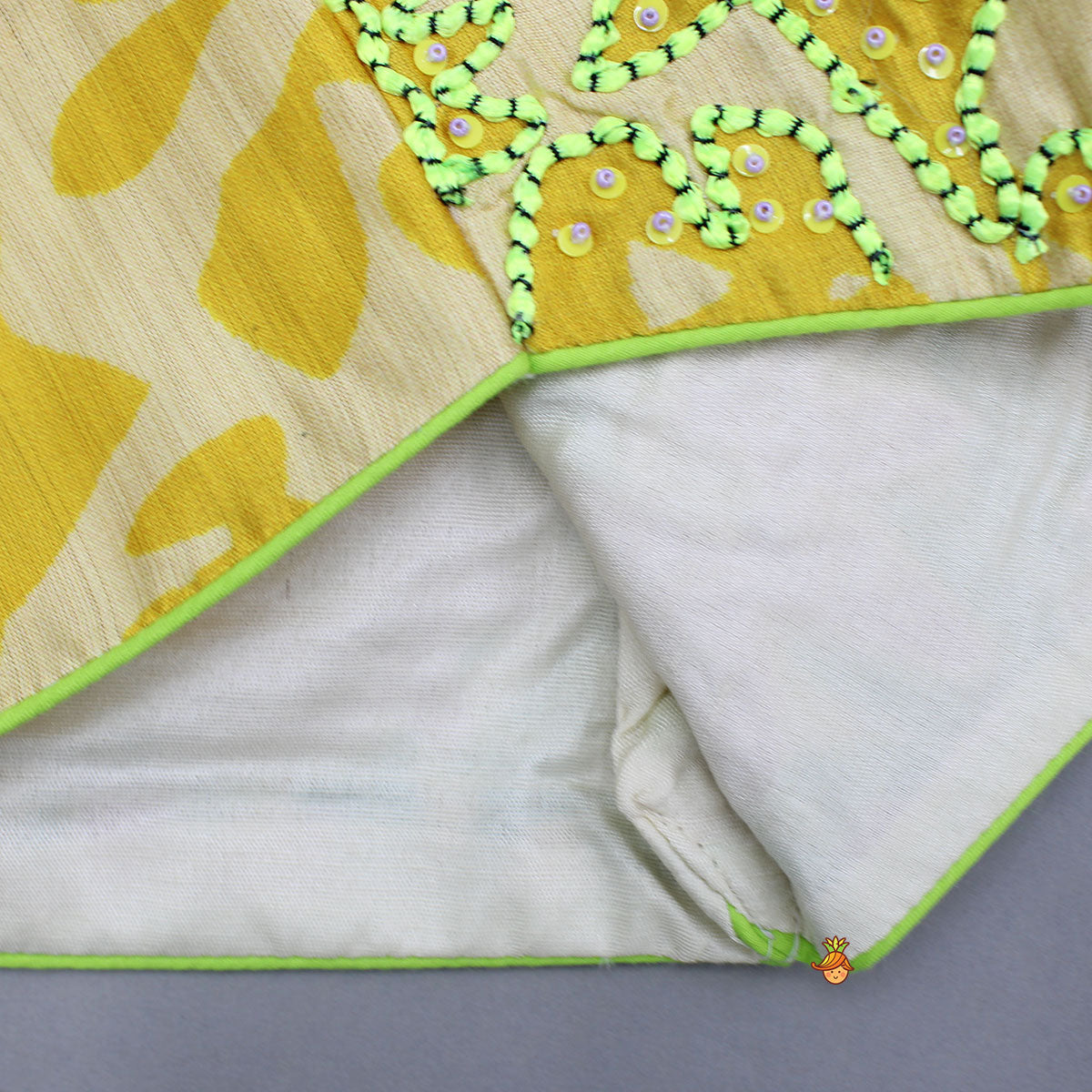 Embroidered Waist Coat Style Top With Skirt Style Lehenga And Bow Hair Clip