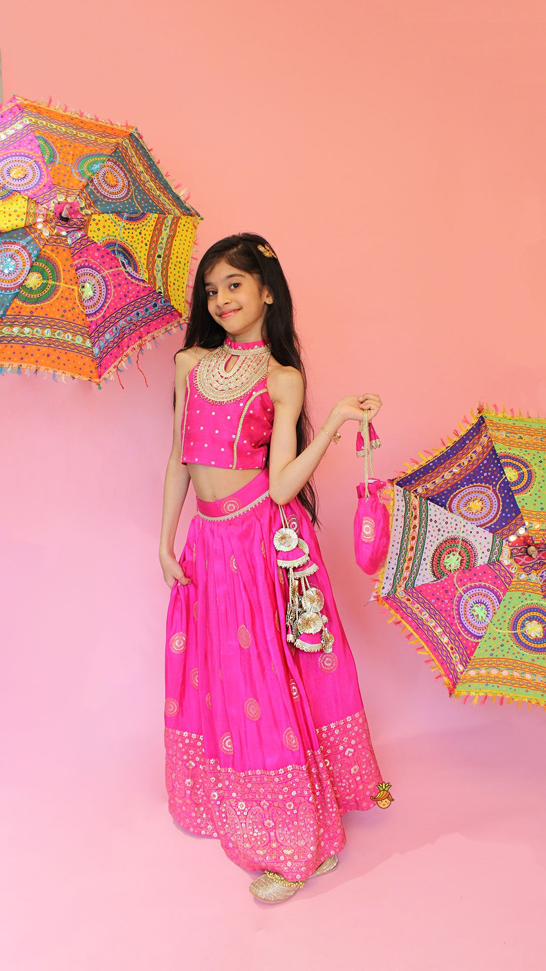 Beautiful Pink Embroidered Halter Neck Top With Lehenga And Dupatta With Potli Bag