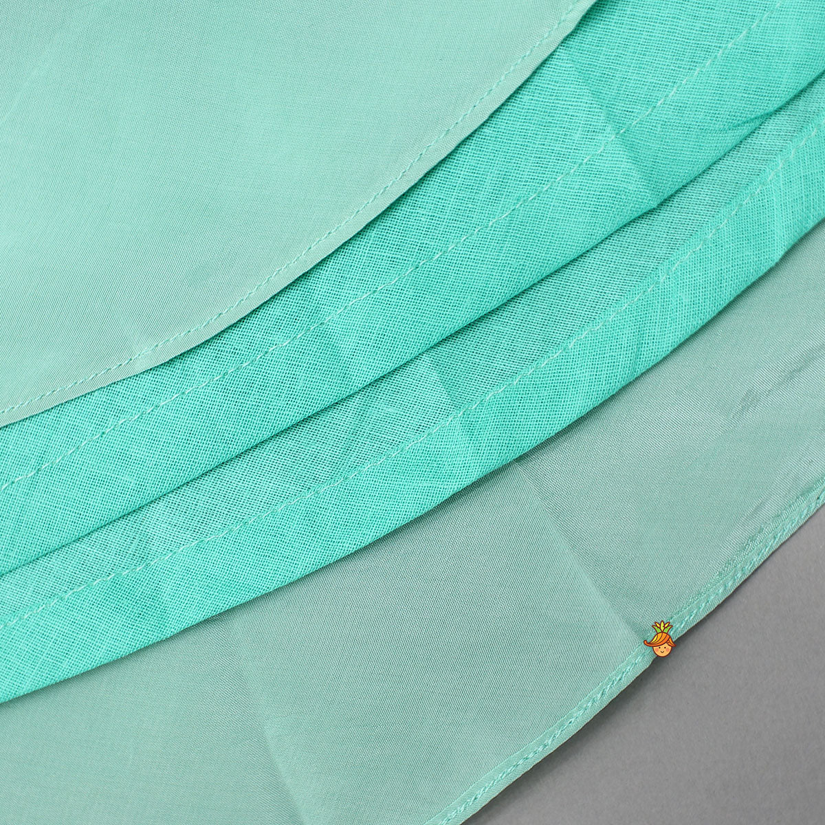 Beautiful Floral Embroidered Green Top With Asymmetrically Layered Lehenga