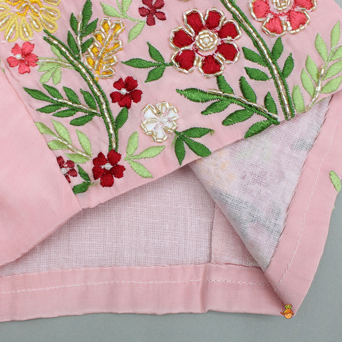 Beautiful Floral Embroidered Top With Asymmetrically Layered Lehenga