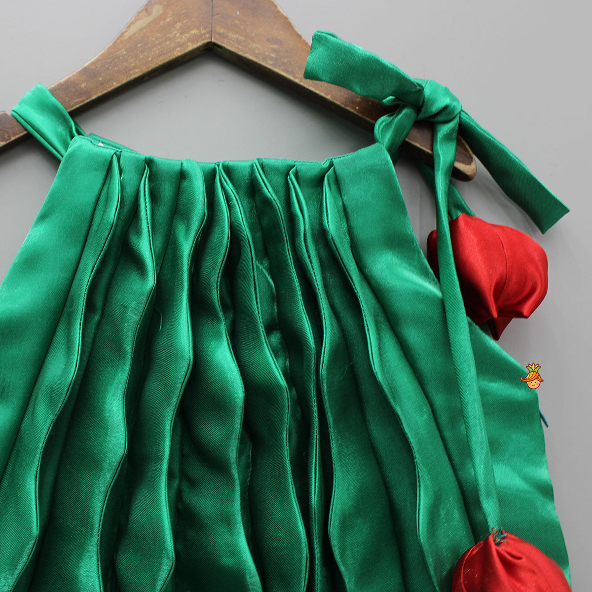 Sheen Green Satin Pleated Dress With Red Floral Tie-Up Detail