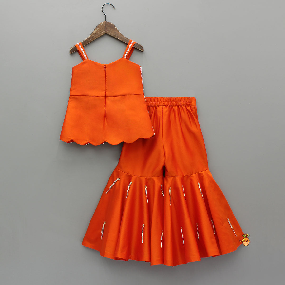 Exquisite Orange Kurti With Flared Sharara And Choker Dupatta