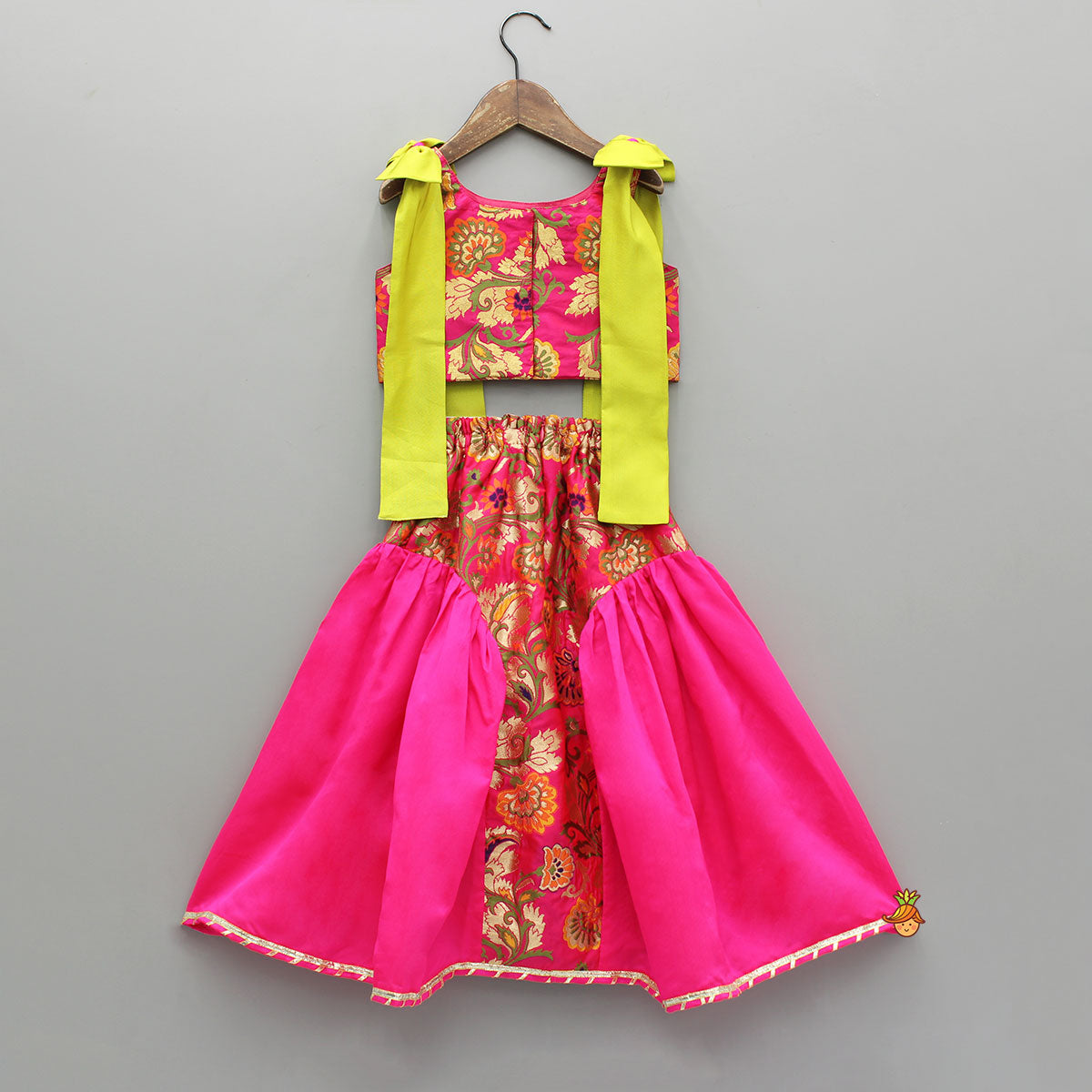 Stunning Bow Embellished Floral Top With Matching Lehenga And Attached Pouch