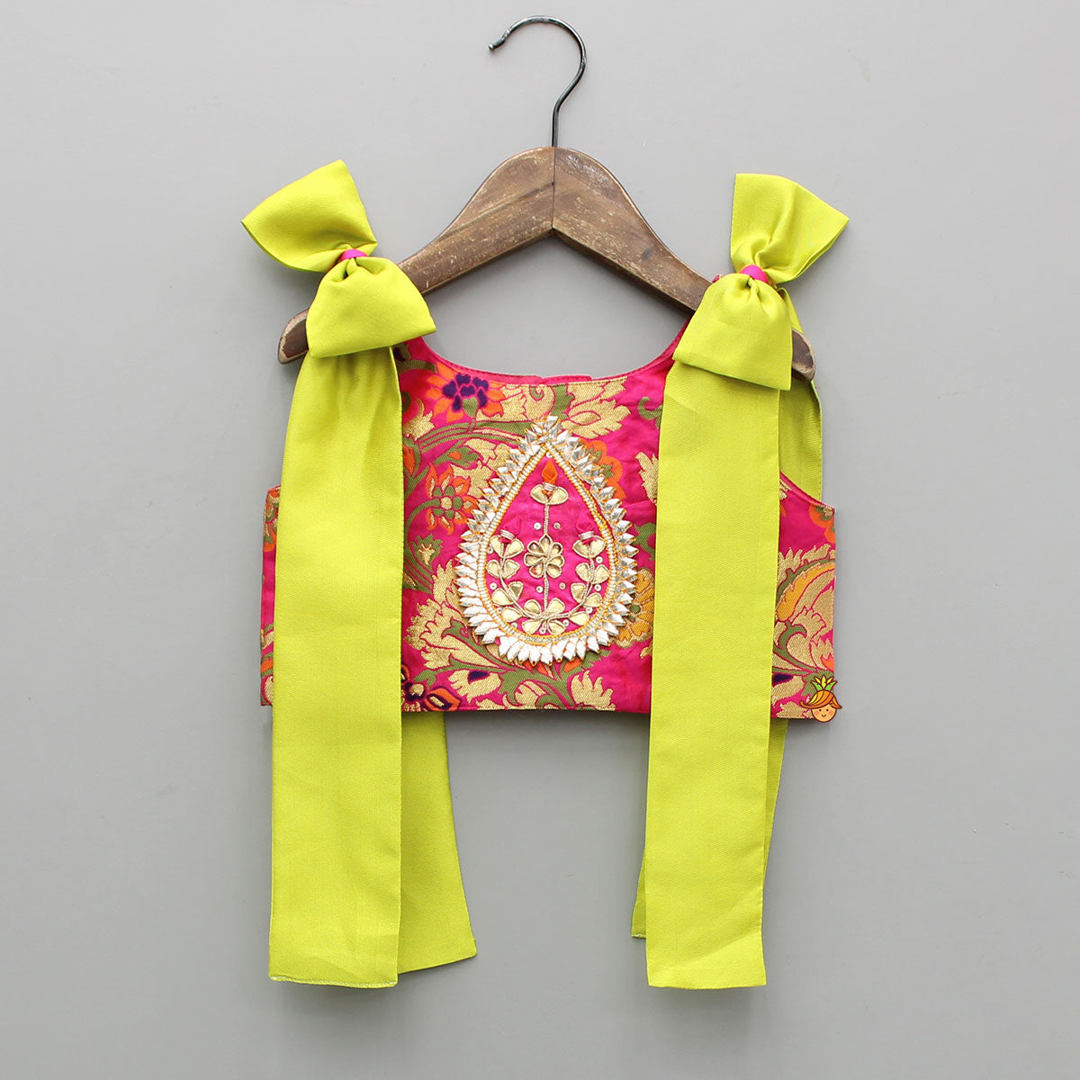 Stunning Bow Embellished Floral Top With Matching Lehenga And Attached Pouch
