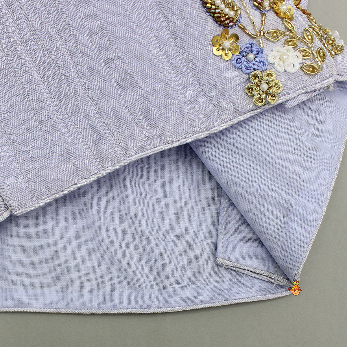 Sleeveless Floral Embroidered Sheen Lavender Top With Shimmery Lehenga