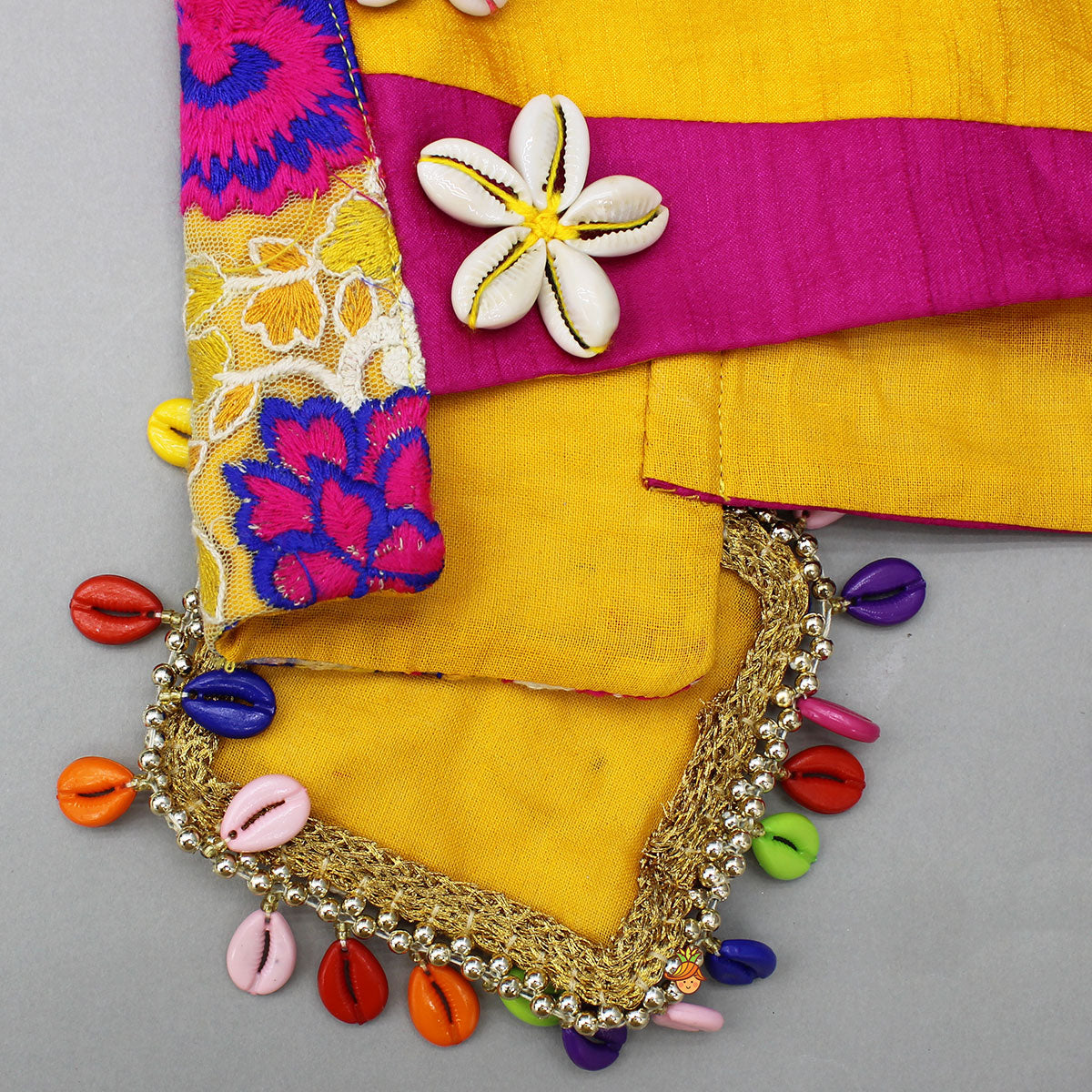 Cowrie Shell Embellished Yellow Embroidered Top With Lehenga
