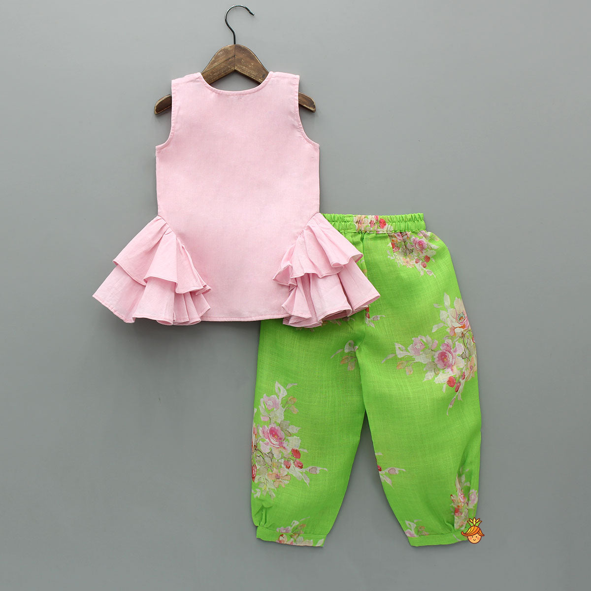 Adorable Sleeveless Ruffle Detailed Top With Floral Pants