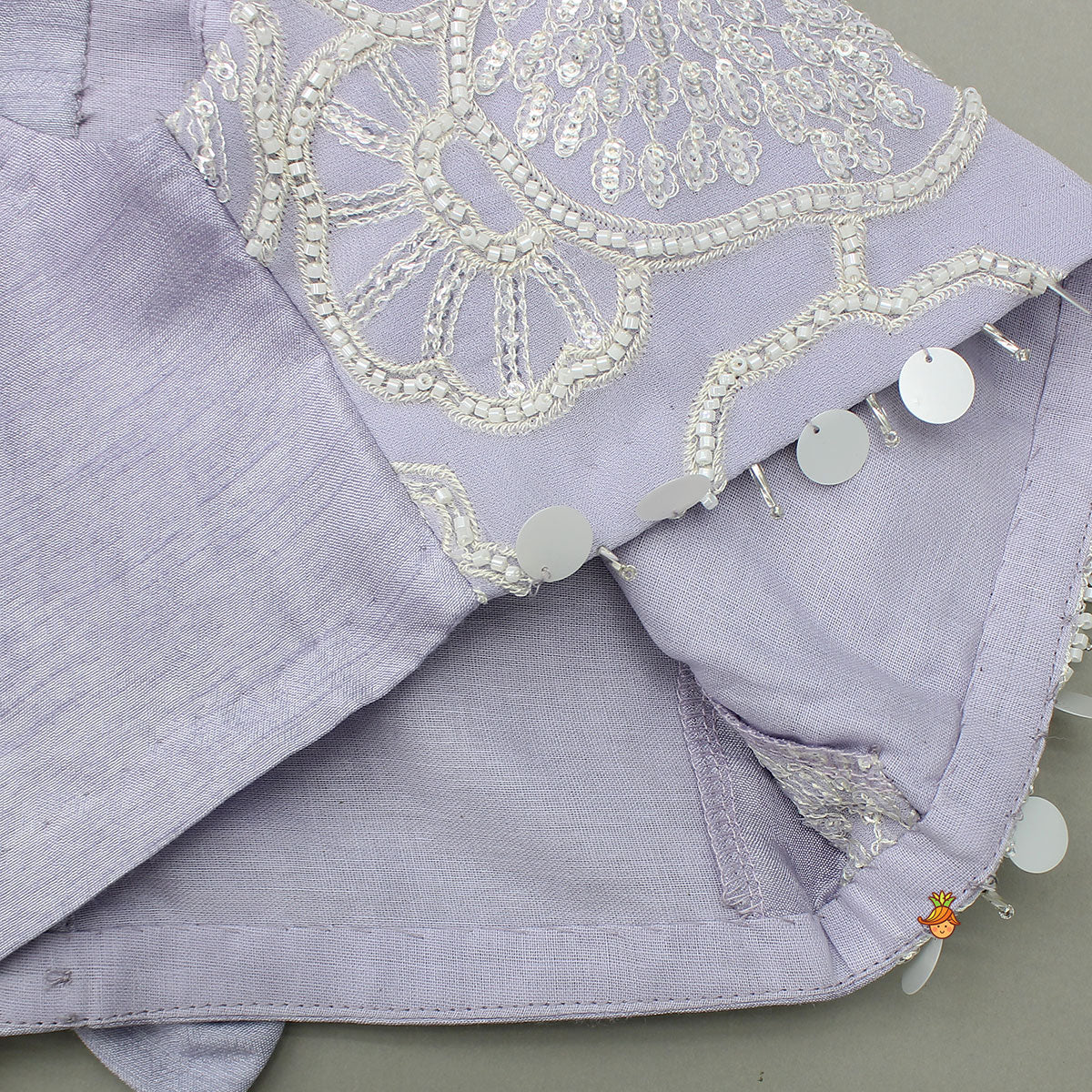 Lavender Bow Adorned Sleeveless Embroidered Top With Lehenga