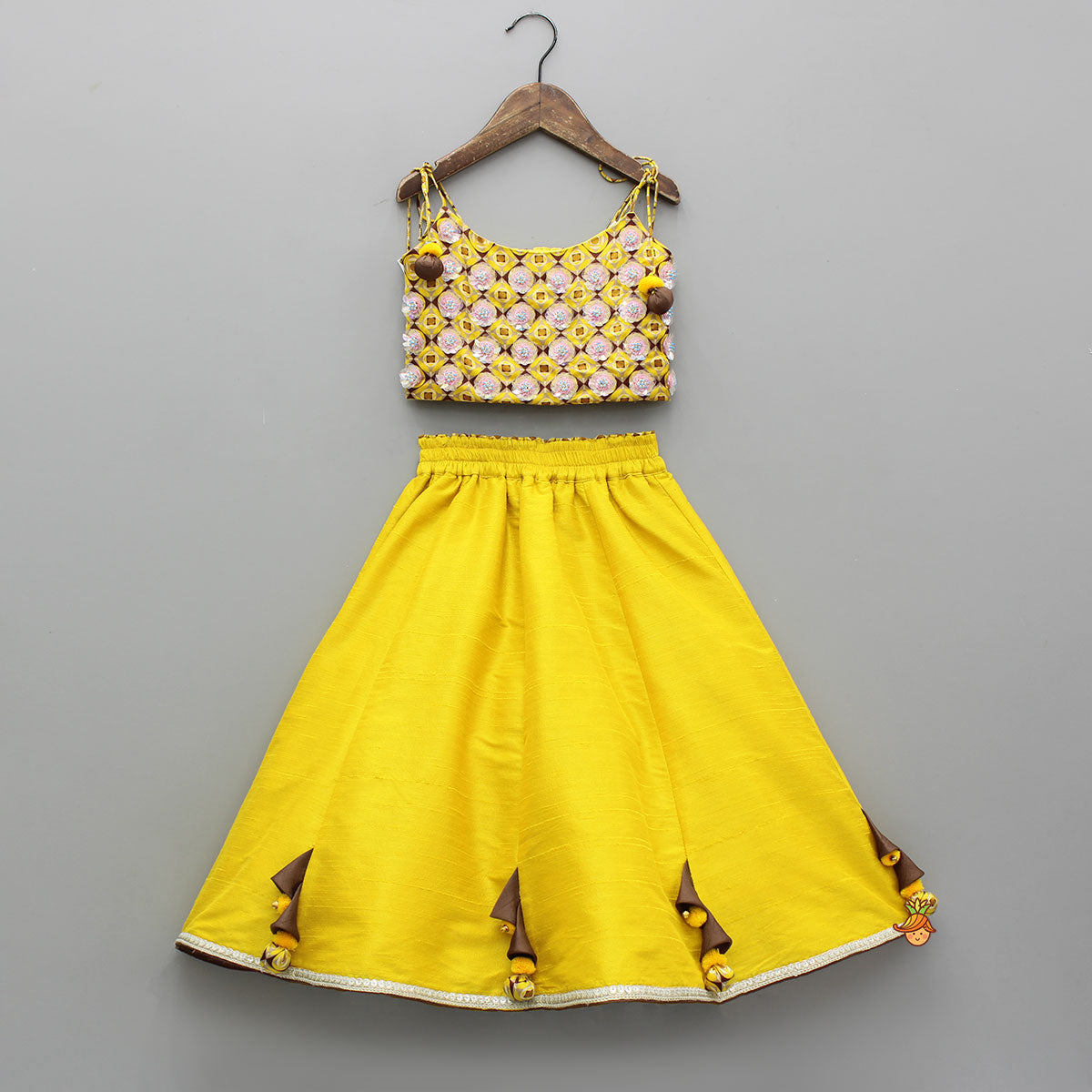 Flowers Adorned Smocked Tie Up Top With Lehenga And Waist Belt