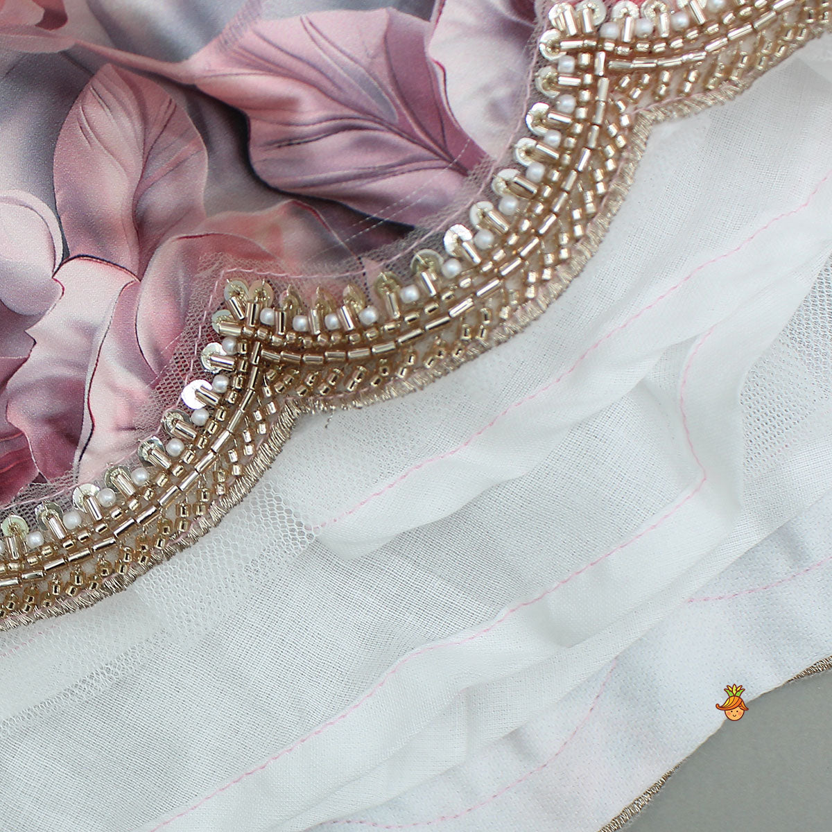 Printed Strappy Top And Graceful Layered Lehenga