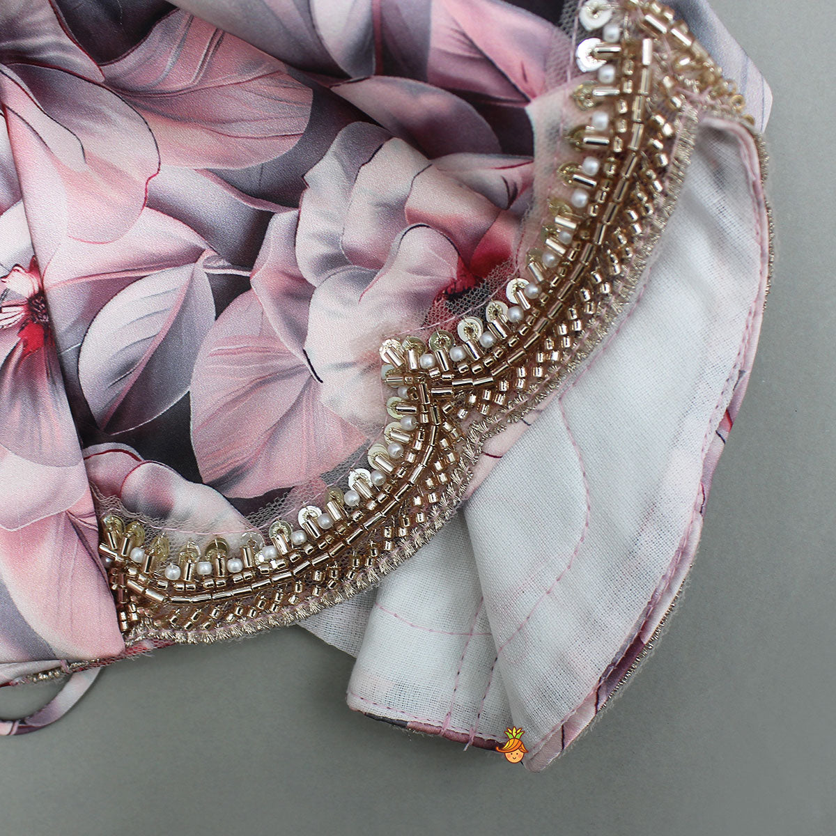 Printed Strappy Top And Graceful Layered Lehenga