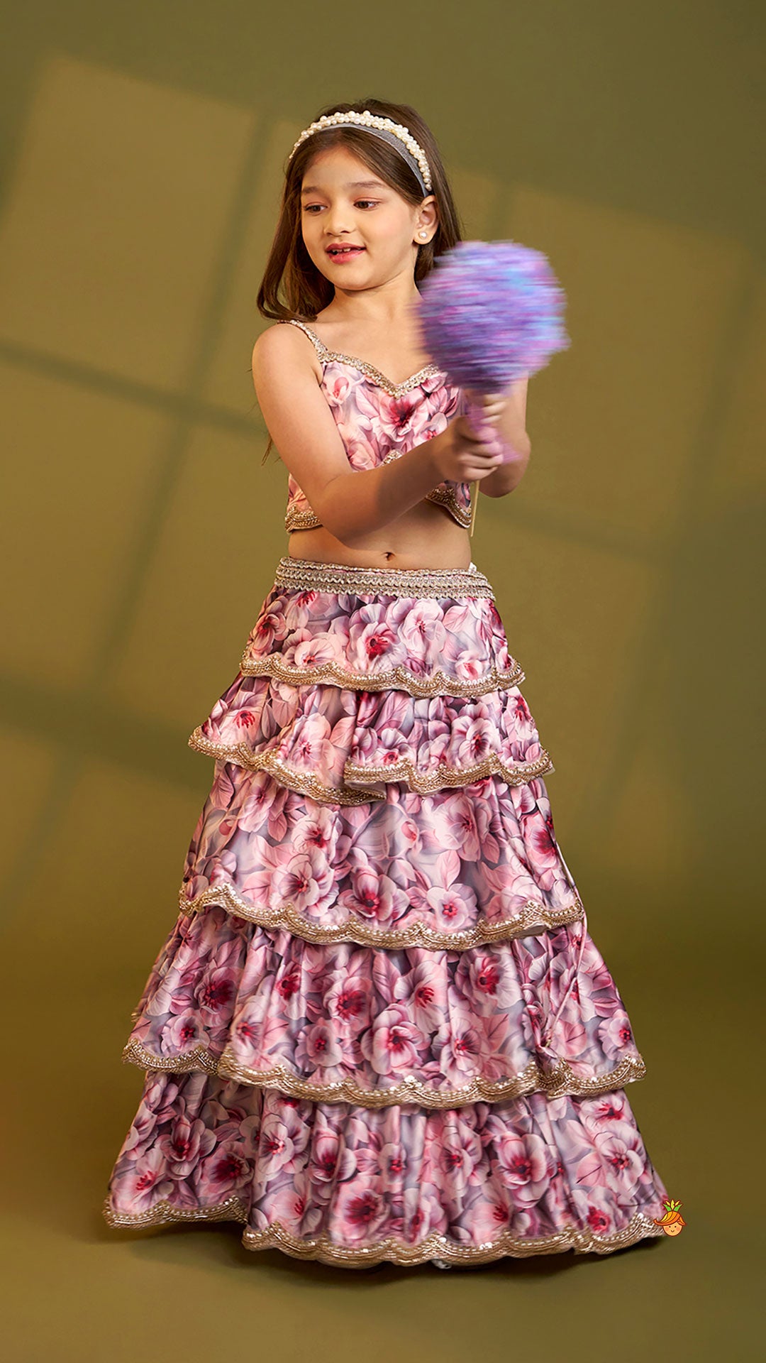 Printed Strappy Top And Graceful Layered Lehenga