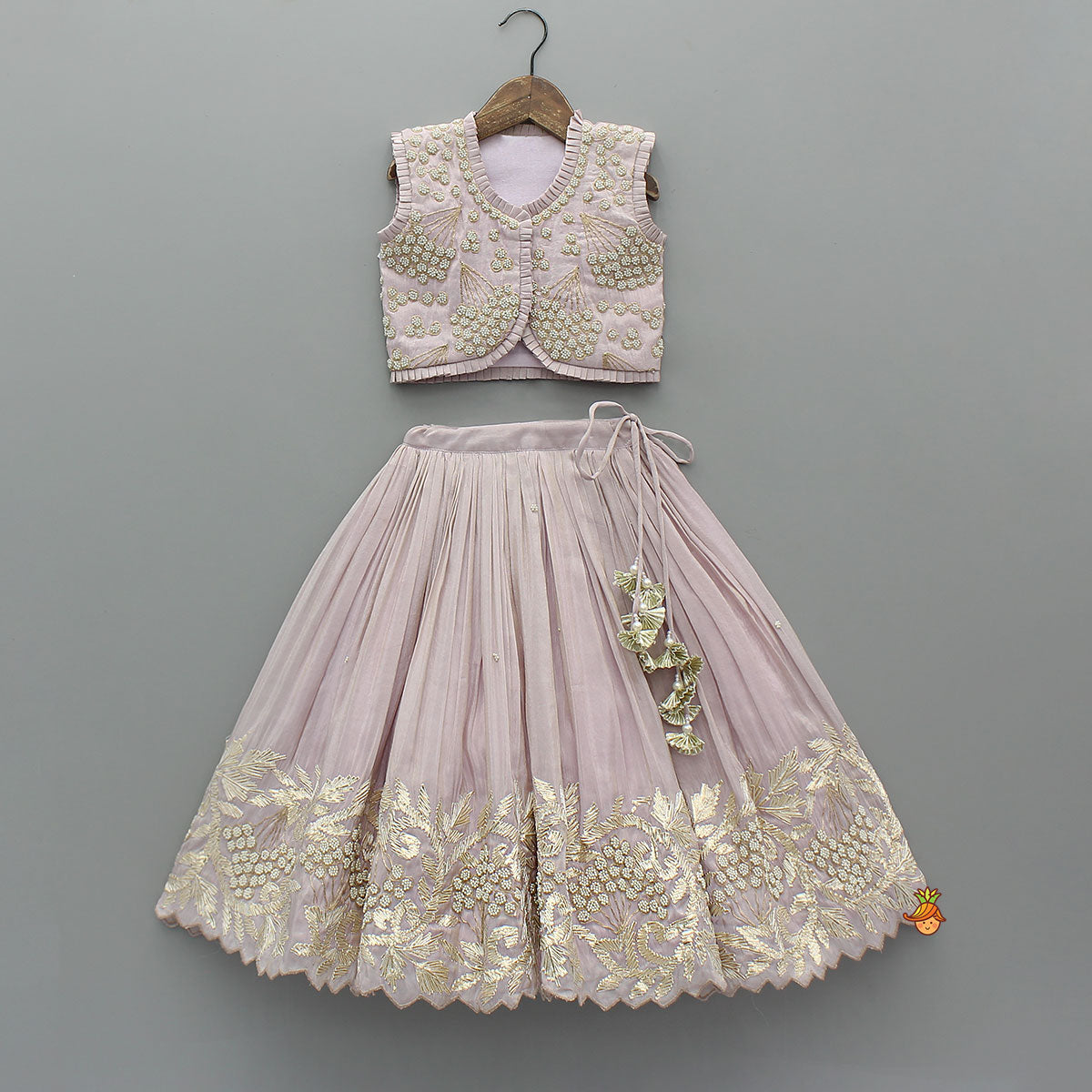 Embroidered Stylish Hem Shimmery Top And Pleated Lehenga With Net Dupatta