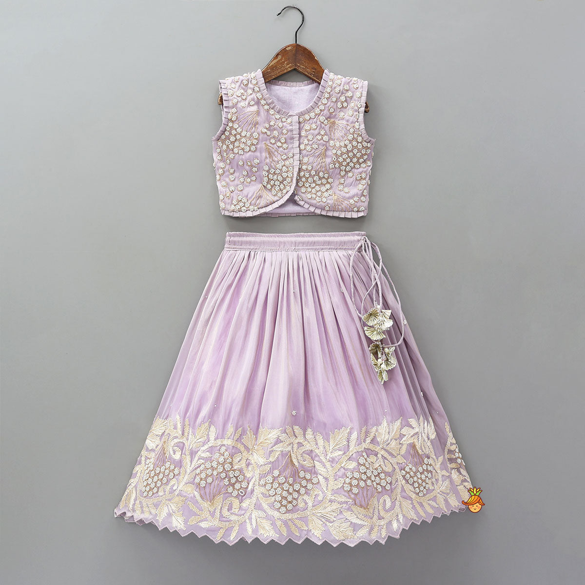 Embroidered Stylish Hem Shimmery Top And Pleated Lehenga With Net Dupatta