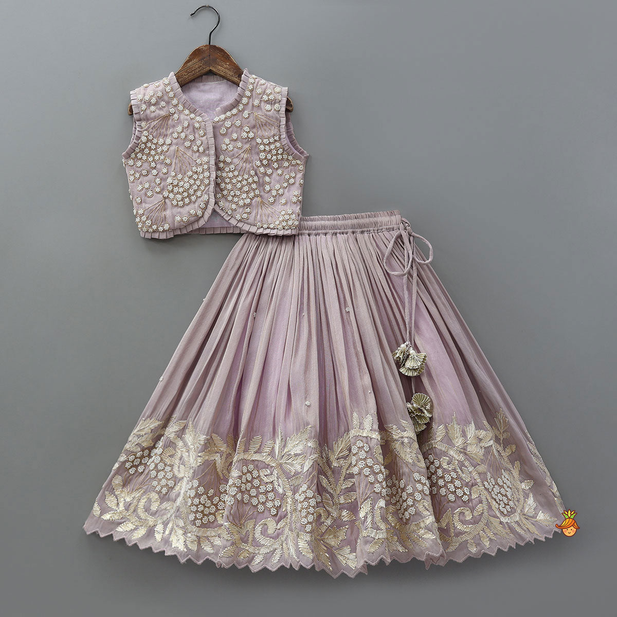 Embroidered Stylish Hem Shimmery Top And Pleated Lehenga With Net Dupatta