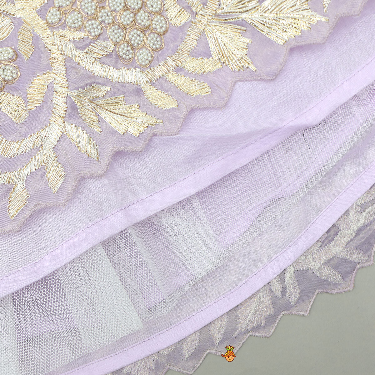 Embroidered Stylish Hem Shimmery Top And Pleated Lehenga With Net Dupatta