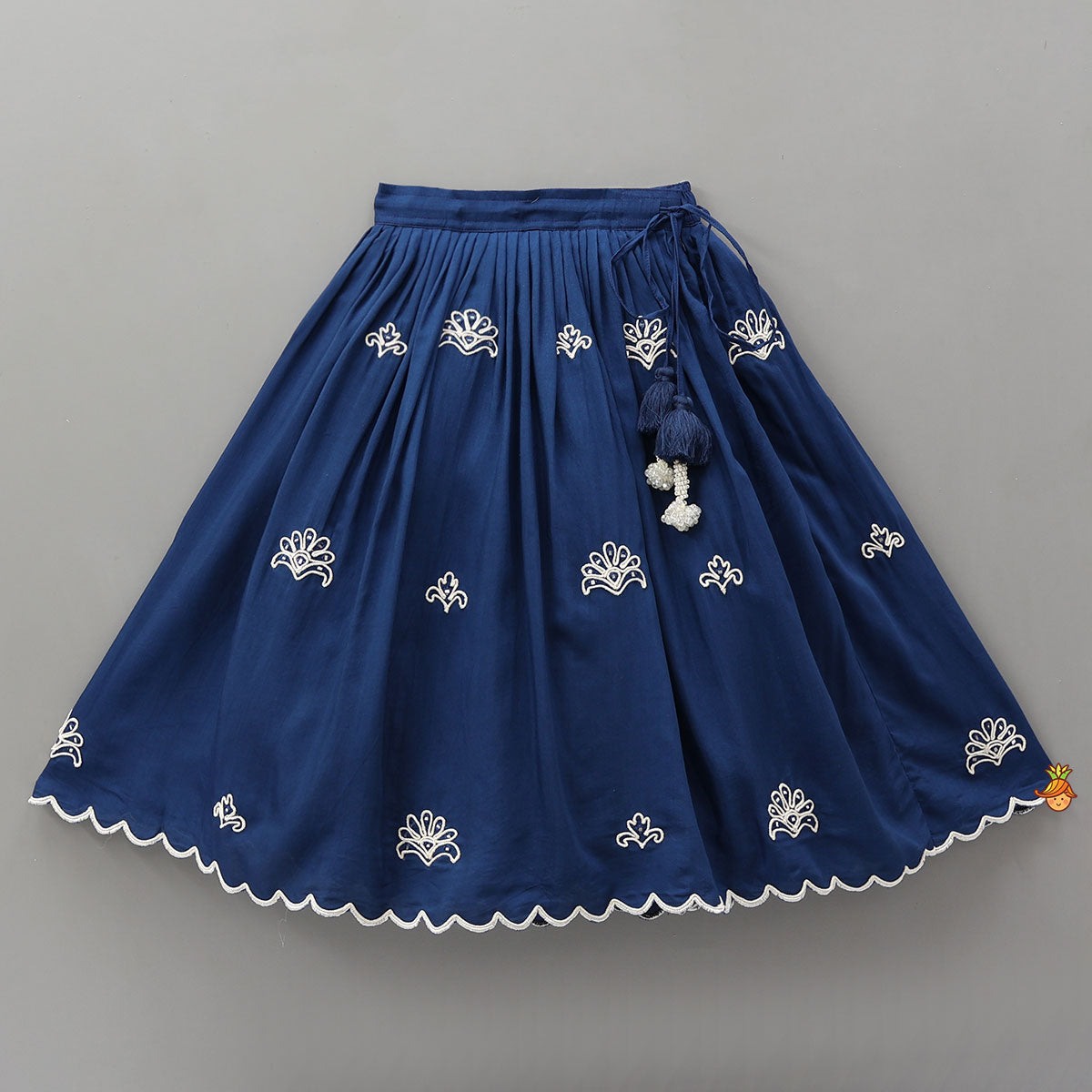 Dual Back Knot Detail Top And Tassels Enhanced Lehenga