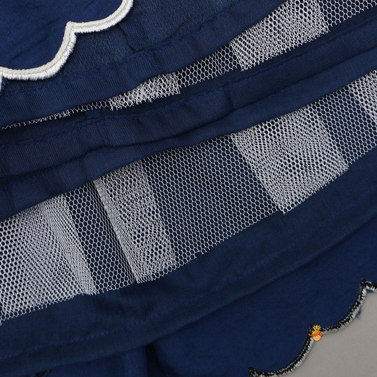 Dual Back Knot Detail Top And Tassels Enhanced Lehenga