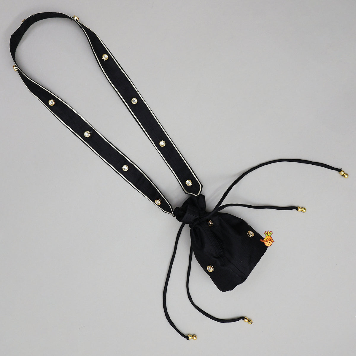 Brocade Jacket Style Top And Dhoti With Matching Potli Bag