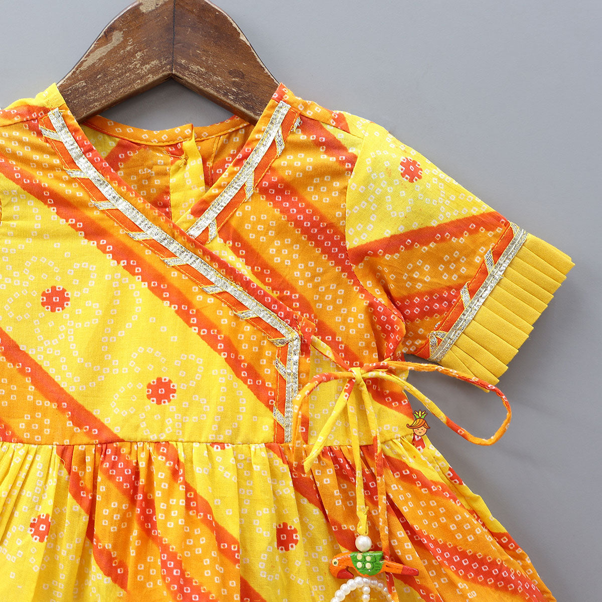 Bandhani Printed Angarkha-Style Kurti With Headband And Booties